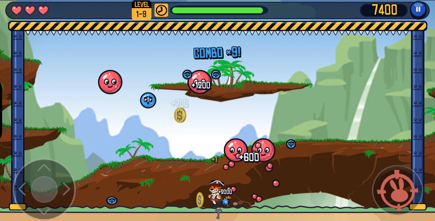 Gameplay: a tiger in a pirate hat popping red and blue bubbles